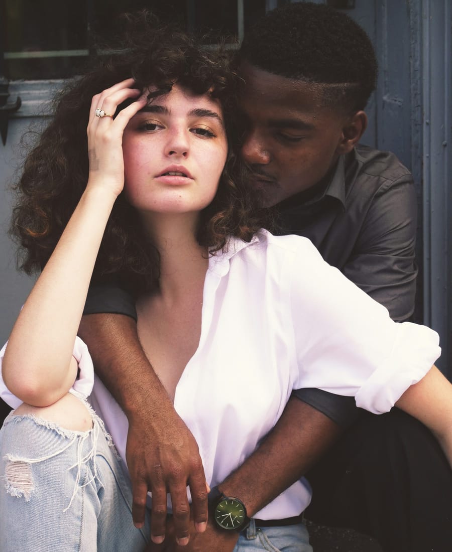 A couple from different backgrounds embracing